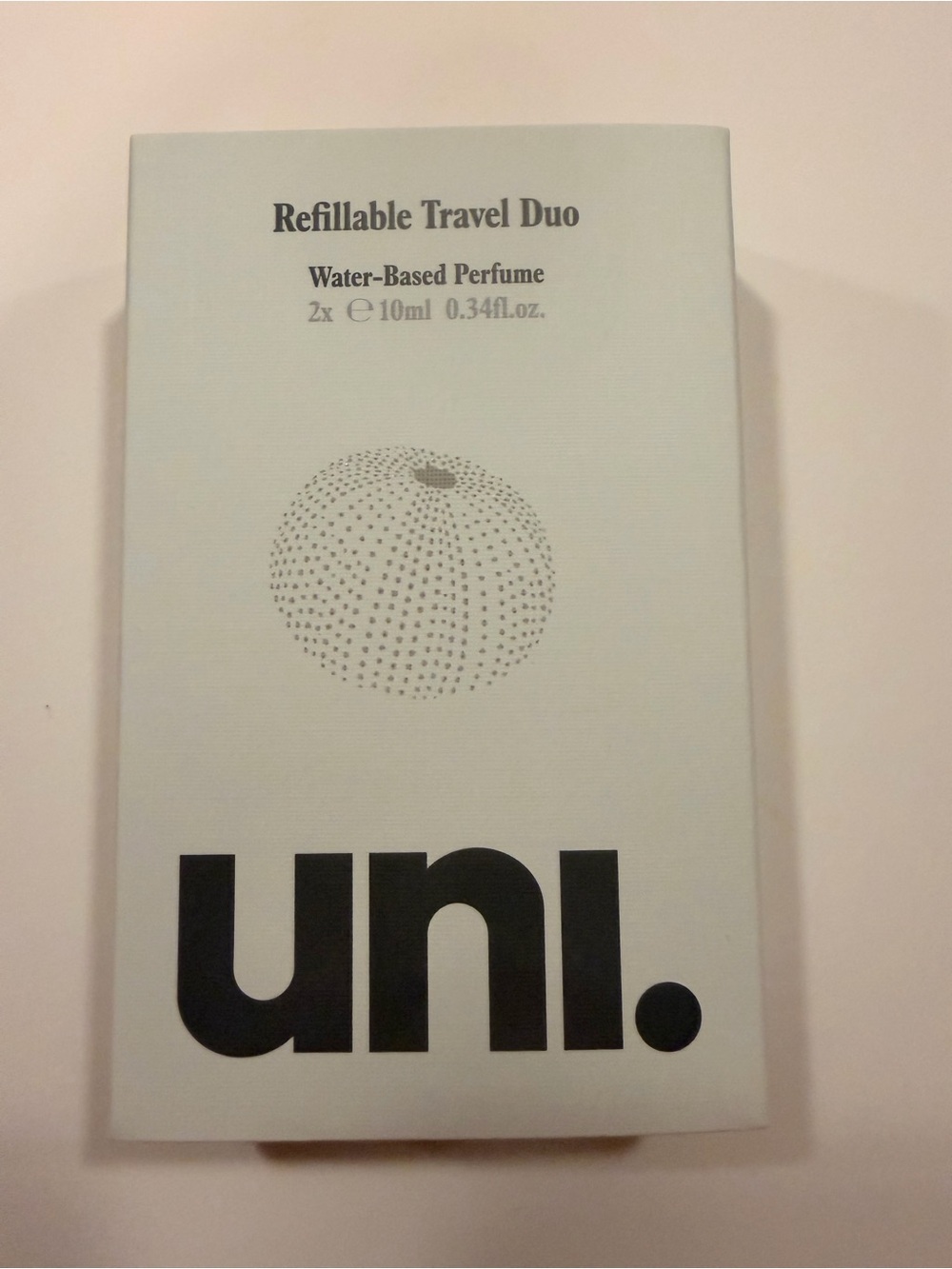 Uni. Refillable Travel Fragrance Duo: Rain o & Sunset BNIB water-based perfume